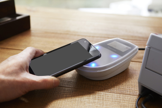 ポイントで支払いをしている写真